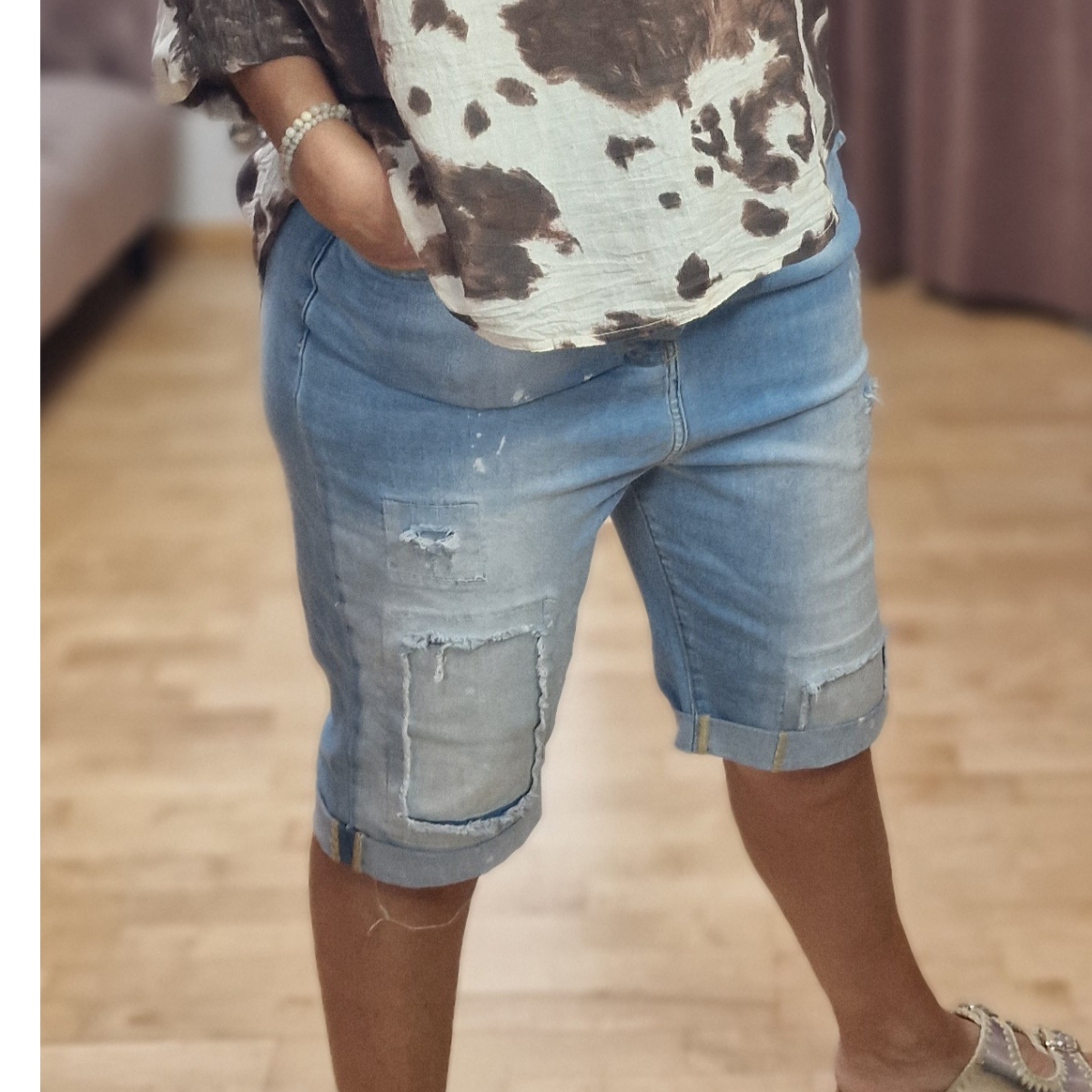Jeans über Knie 